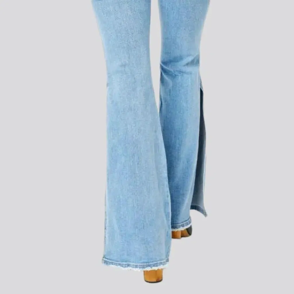 Light-wash sanded jeans
 for women